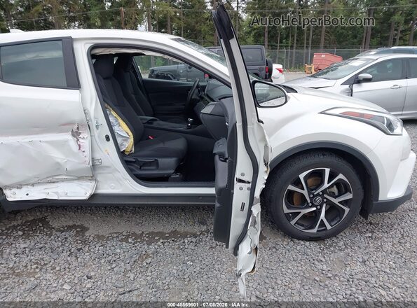NMTKHMBX1JR037476 2018 TOYOTA C-HR Белый Вид салона спереди