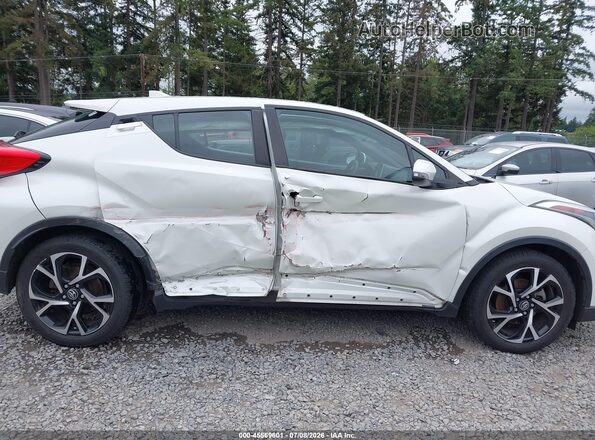NMTKHMBX1JR037476 2018 TOYOTA C-HR Белый Вид задней части салона