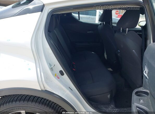 NMTKHMBX4JR049573 2018 TOYOTA C-HR White Вид наклейки з VIN-кодом