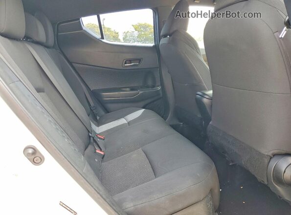 NMTKHMBX6JR054774 2018 TOYOTA C-HR White Rear seats view
