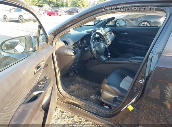 NMTKHMBX8JR047342 2018 TOYOTA C-HR Black წინა სალონის ხედი