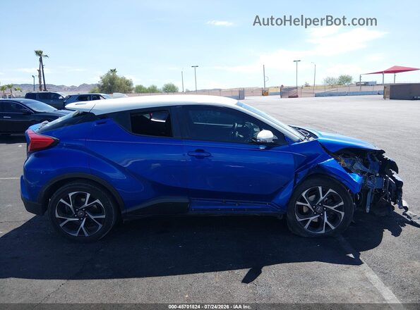 NMTKHMBX8KR094386 2019 TOYOTA C-HR Blue Вид задньої частини салону