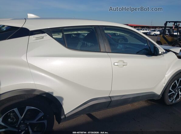 NMTKHMBX9JR009764 2018 TOYOTA C-HR Белый Вид задней части салона