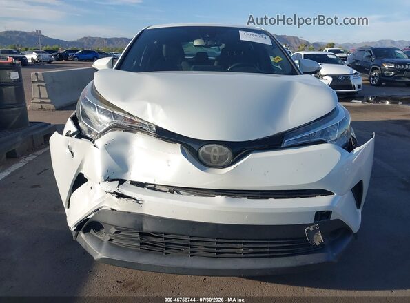 NMTKHMBX9JR009764 2018 TOYOTA C-HR Белый Вид щитка приборов