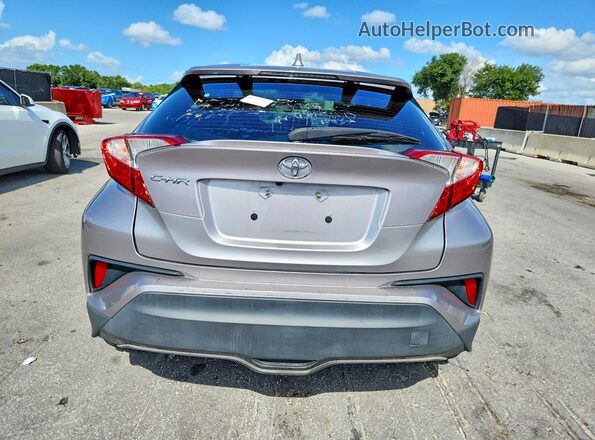NMTKHMBX9LR106823 2020 TOYOTA C-HR Silver Rear view