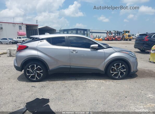 NMTKHMBX9LR113058 2020 TOYOTA C-HR Gray Vista interior trasera