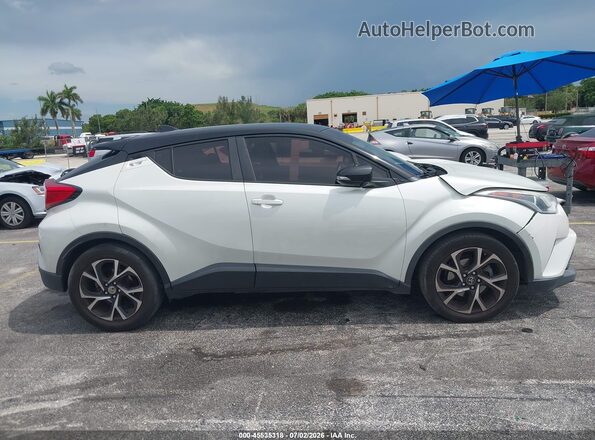 NMTKHMBXXKR097645 2019 TOYOTA C-HR White Вид задньої частини салону