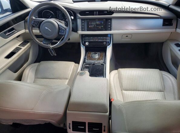 SAJBE4BV9GCY10991 2016 JAGUAR XF White Vista del salpicadero