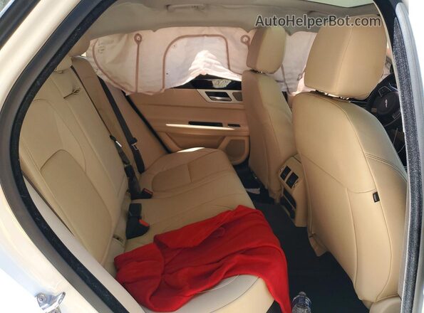 SAJBJ4BV2GCY16403 2016 JAGUAR XF White Vista de los asientos traseros