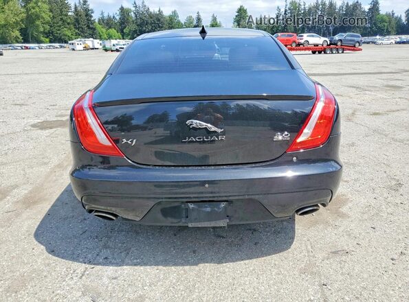 SAJWJ1CD7G8W00474 2016 JAGUAR XJ Черный Вид сзади