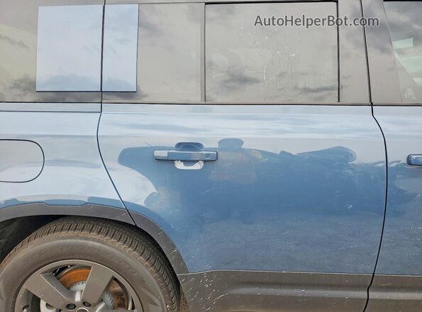 SALEJ7EX0S2406488 2025 LAND ROVER DEFENDER Blue Rear seats view