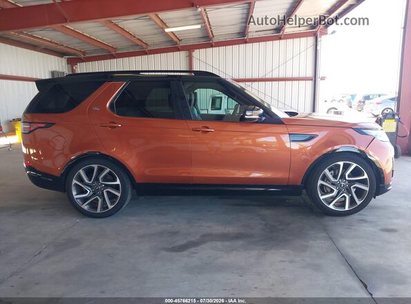 SALRT2RV6JA075668 2018 LAND ROVER DISCOVERY Orange Rear interior view