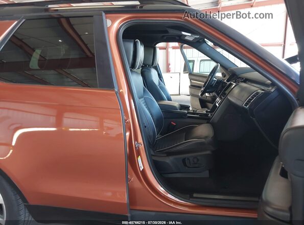 SALRT2RV6JA075668 2018 LAND ROVER DISCOVERY Orange Front interior view