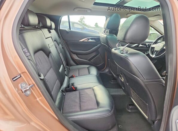 SJKCH5CP3KA008597 2019 INFINITI QX30 Brown Rear interior view