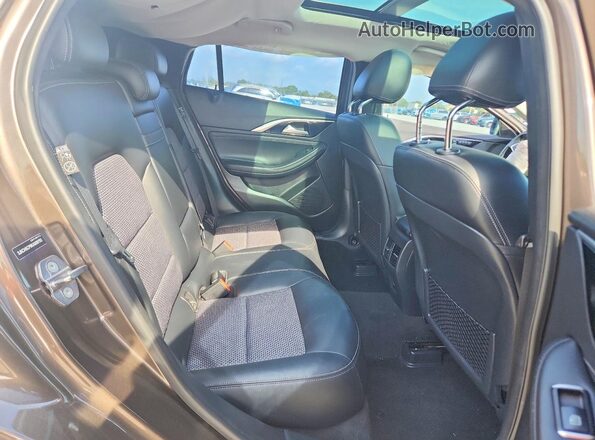 SJKCH5CP8KA009793 2019 INFINITI QX30 Коричневый Вид задней части салона