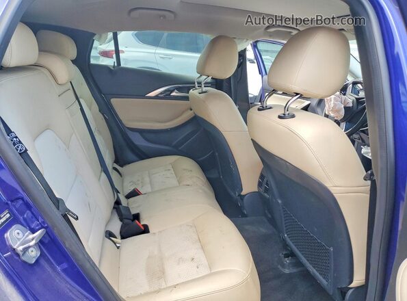 SJKCH5CP9KA011293 2019 INFINITI QX30 Blue Vista de los asientos traseros