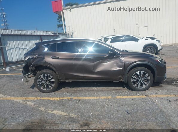 SJKCH5CR3JA046296 2018 INFINITI QX30 Brown Rear interior view