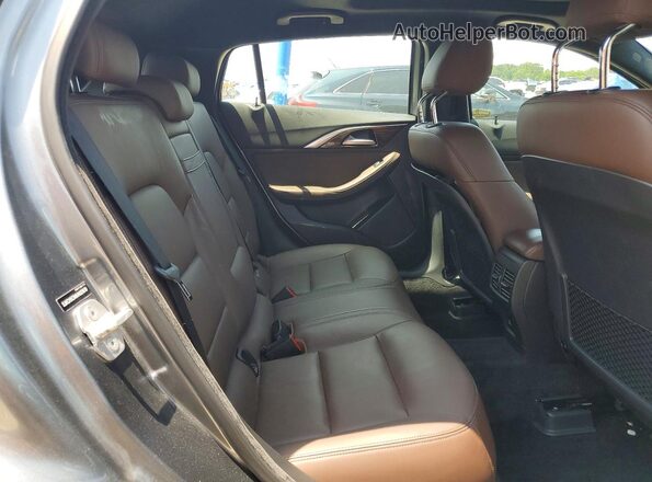 SJKCH5CR4HA023619 2017 INFINITI QX30 Beige Vista interior trasera