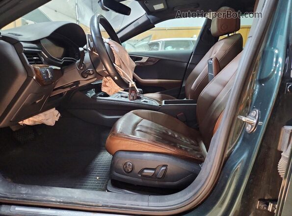 WA18NAF4XHA165056 2017 AUDI A4 Green Front interior view