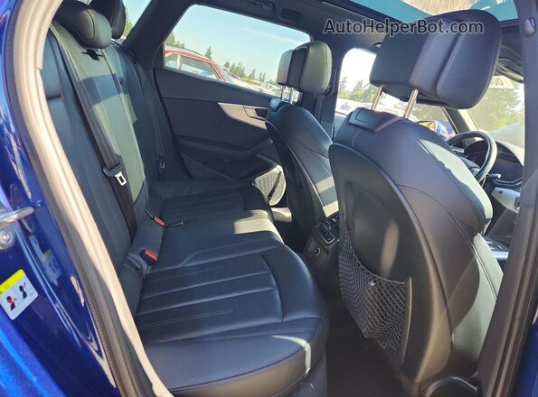 WA19NAF46JA051839 2018 AUDI A4 Blue Vista de los asientos traseros