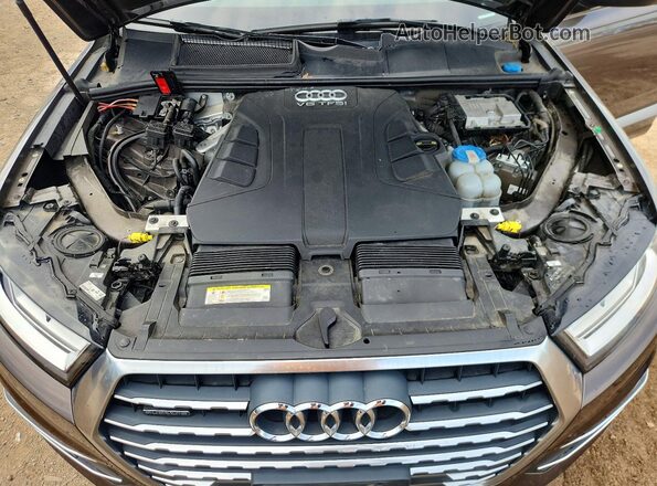 WA1AAAF71HD008697 2017 AUDI Q7 Brown Widok wnętrza z tyłu
