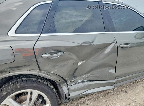 WA1DECF32L1058349 2020 AUDI Q3 Gray Vista interior trasera