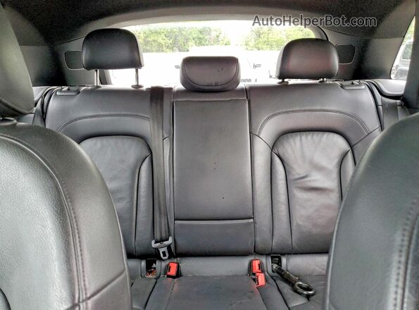 WA1JCCFS0HR000636 2017 AUDI Q3 Black Vista de los asientos traseros