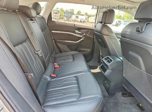 WA1VABGE7KB008940 2019 AUDI E-TRON Silver Rear seats view