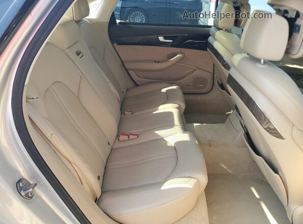 WAU34AFD2GN011870 2016 AUDI A8 Gold Vista de los asientos traseros