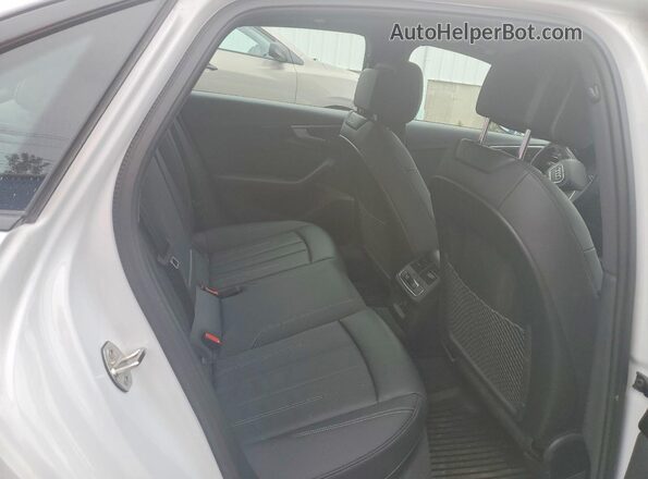WAUAAAF45RN015379 2024 AUDI A4 White Vista de los asientos traseros