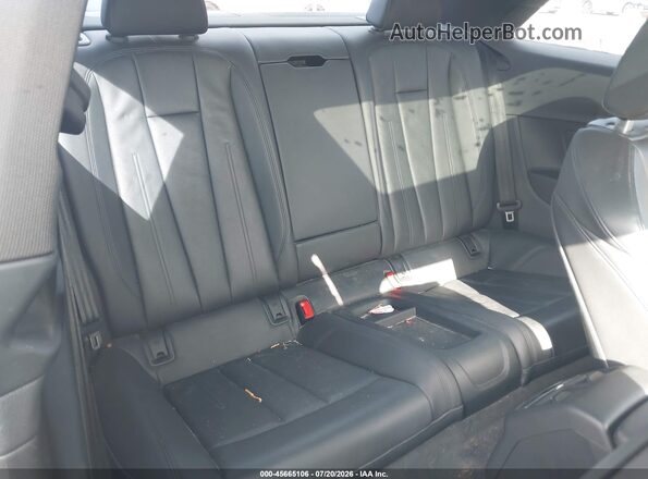 WAUTNAF58JA082883 2018 AUDI A5 Black Vista de la etiqueta del VIN
