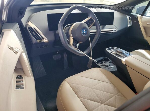 WB523CF03RCP19890 2024 BMW IX Gray Widok deski rozdzielczej