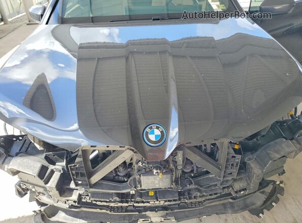 WB523CF03RCP19890 2024 BMW IX Gray Widok komory silnika