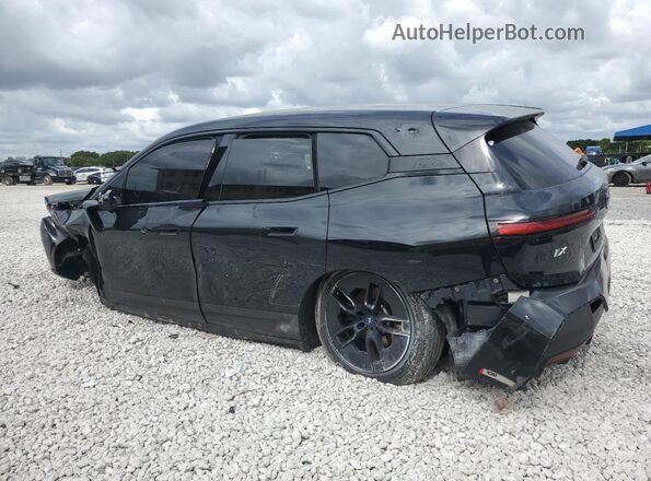 WB523CF04RCN46056 2024 BMW IX Black Trasero izquierdo