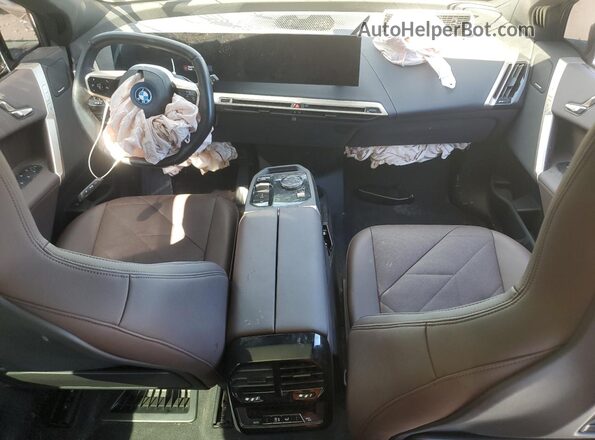 WB523CF04RCN46056 2024 BMW IX Black Vista del salpicadero