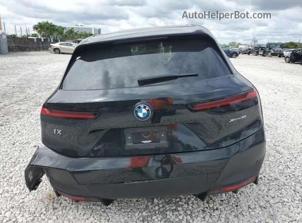 WB523CF04RCN46056 2024 BMW IX Black Vista trasera