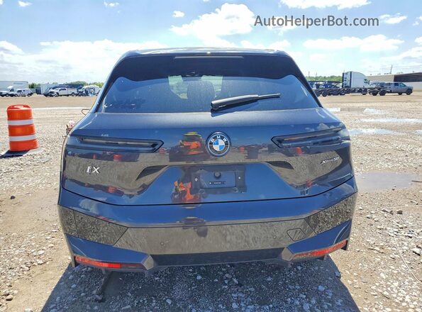 WB523CF05SCT45837 2025 BMW IX Gray Rear view