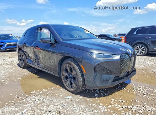 WB523CF05SCT45837 2025 BMW IX Gray Front right
