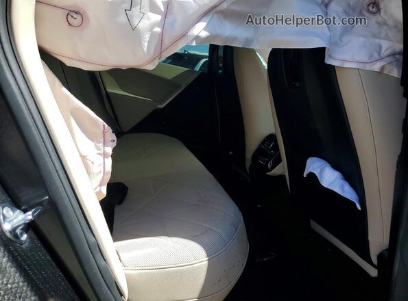 WB523CF05SCT45837 2025 BMW IX Gray Rear seats view