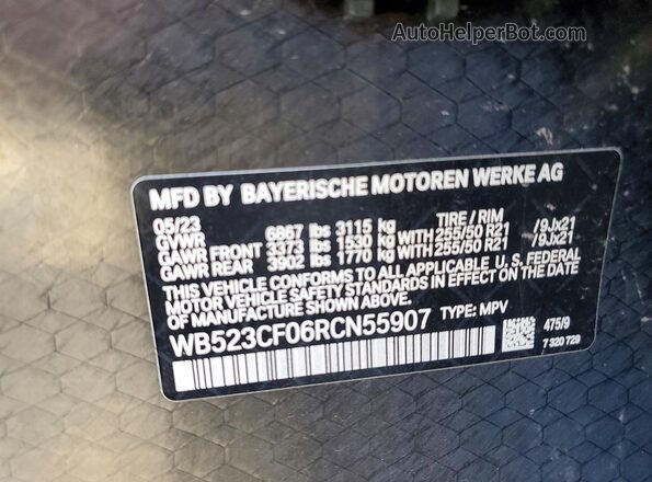 WB523CF06RCN55907 2024 BMW IX Black Widok naklejki z numerem VIN