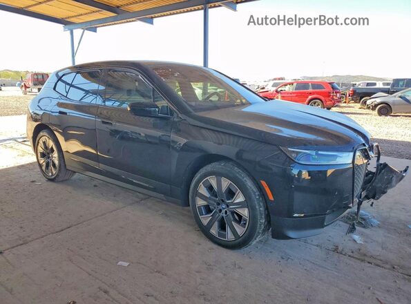 WB523CF06SCU57420 2025 BMW IX Черный Передняя правая четверть