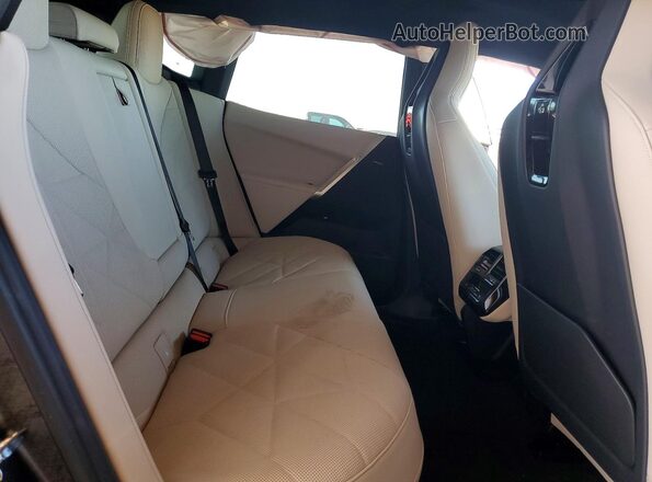 WB523CF06SCU57420 2025 BMW IX Черный Вид задних сидений