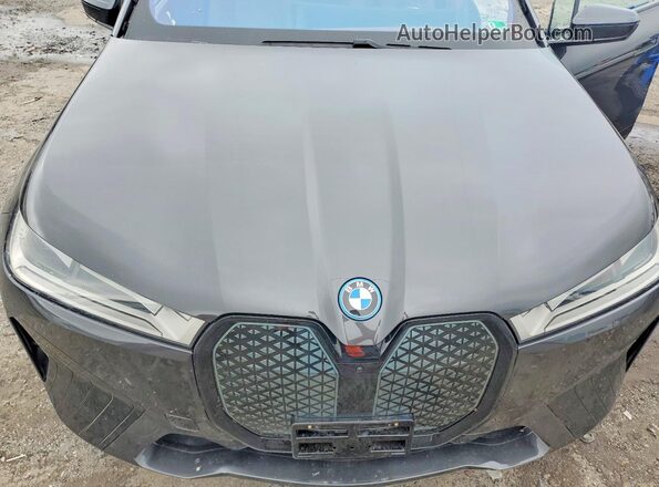 WB523CF08RCP44882 2024 BMW IX Charcoal ძრავის განყოფილების ხედი