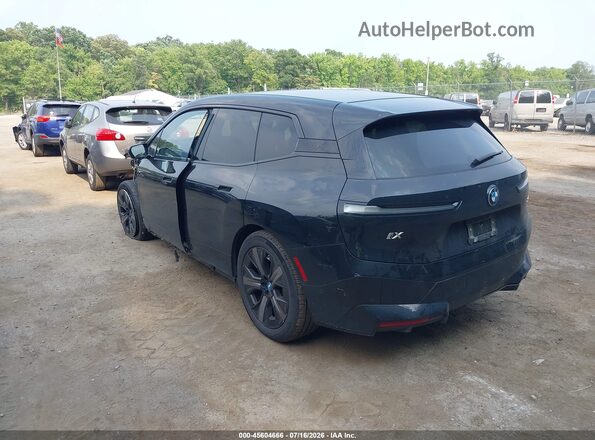 WB523CF0XRCN27186 2024 BMW IX Black Trasero izquierdo