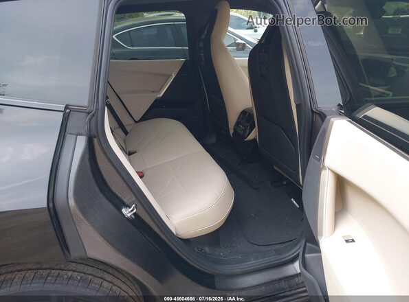 WB523CF0XRCN27186 2024 BMW IX Black Vista de la etiqueta del VIN