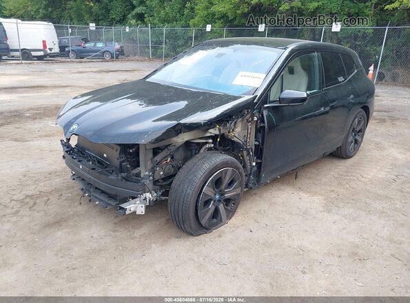 WB523CF0XRCN27186 2024 BMW IX Black Vista tres cuartos delantera izquierda