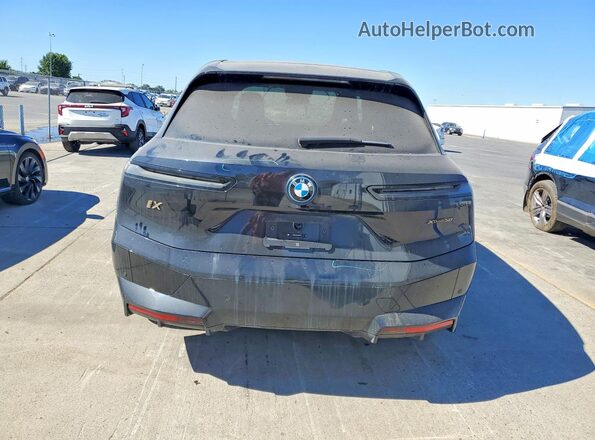 WB523CF0XRCP60355 2024 BMW IX Black უკანა ხედი