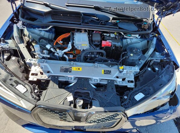 WB523CF0XSCU48350 2025 BMW IX Blue Vista del compartimento del motor
