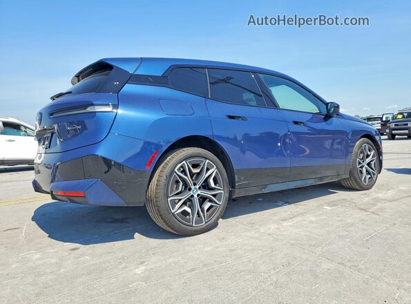 WB523CF0XSCU48350 2025 BMW IX Blue Trasero derecho
