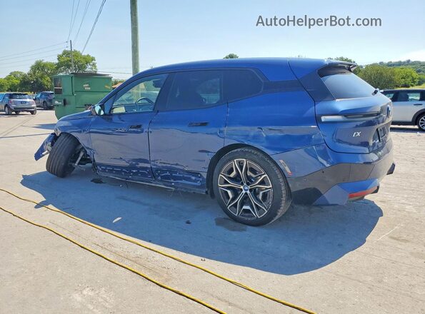 WB523CF0XSCU48350 2025 BMW IX Blue Trasero izquierdo